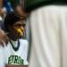 Huron High School senior Demetrius Sims listens on the bench during a timeout in the game against Pickney on Monday, March 4. Daniel Brenner I AnnArbor.com